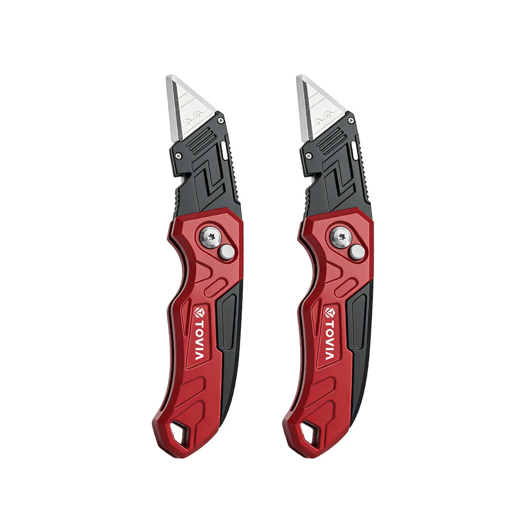 A pair of red and black retractable utility knives with silver blades shown side by side.