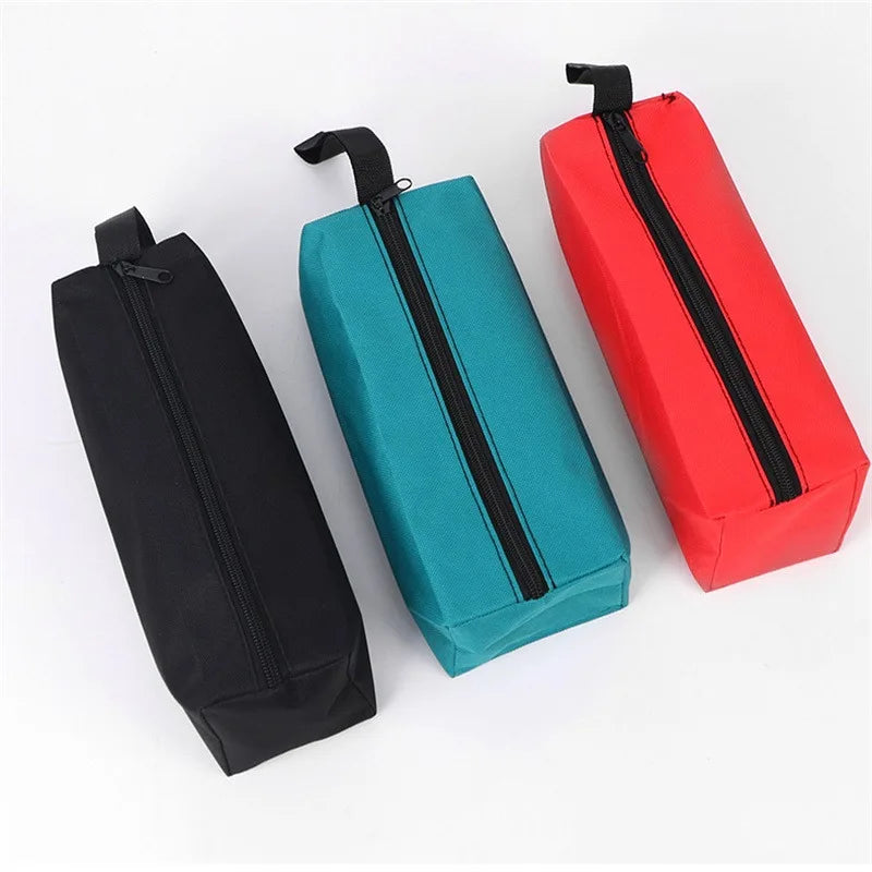 Three hand-held storage bags in black, teal, and red with zippers shown side by side.