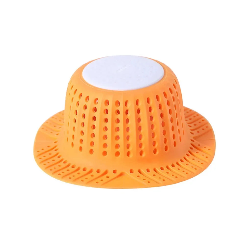 Orange collapsible bathtub drain hair catcher protector with a white top