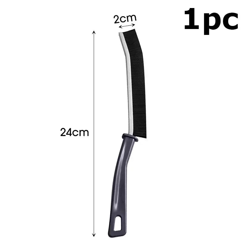 A black and gray grout gap cleaning brush with a 2cm width and a 24cm length.