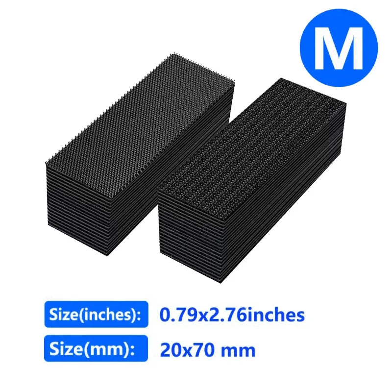 Black double-sided hook and loop carpet fixing tape in a rectangular block.