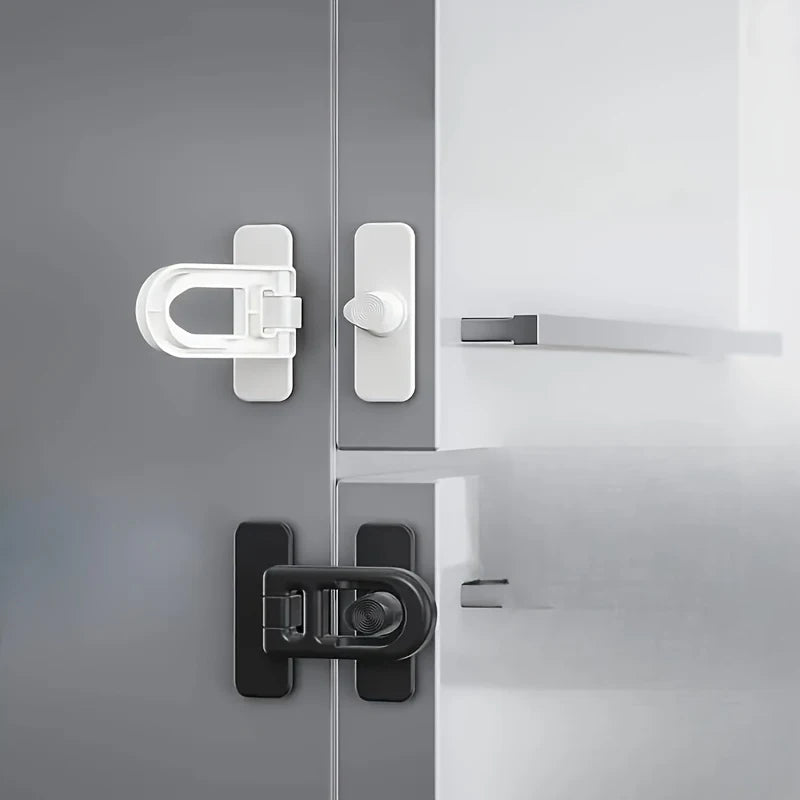 Close-up of modern gray and white refrigerator door locks and hardware.