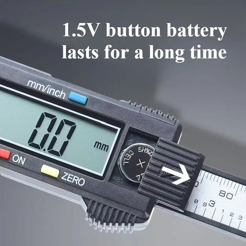 A close-up of a digital caliper showing 0.0 mm measurement and a 1.5V button battery.