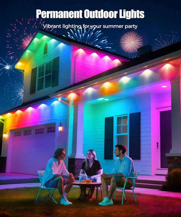 Permanent outdoor lights illuminating a house facade with vibrant colored lighting for a summer party.
