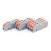A set of gray and orange electrical push-in connectors for wiring applications.