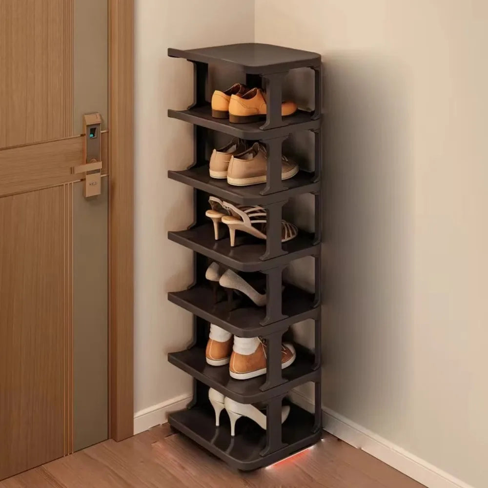 A dark brown stackable vertical shoe rack organizer with multiple tiers for storing shoes.