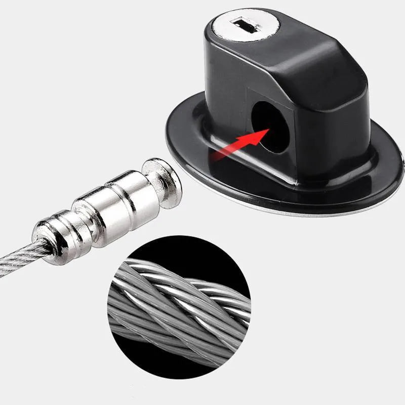 A close-up view of an adjustable cabinet and window safety lock mechanism with a metal shaft and black housing.