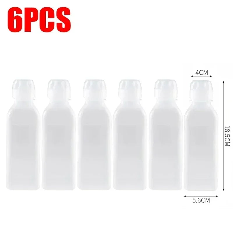 Six clear squeeze dispenser bottles for kitchen seasoning, each measuring 4cm in height.