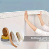 Hands are applying continuous waistline skirting line decals to a white wall molding.