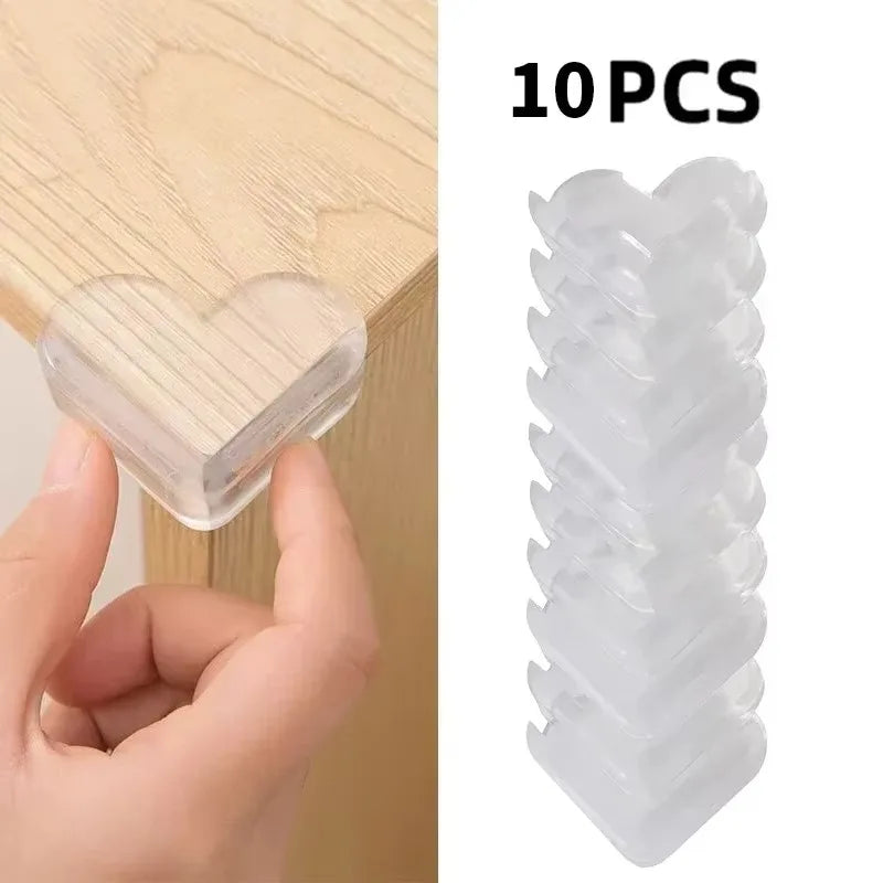 Ten clear plastic safety edge guards for baby protection shown being held against a wooden surface.
