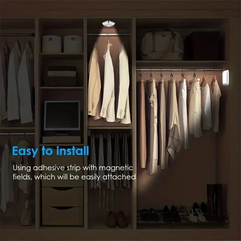 A wooden cabinet displaying clothing and accessories, featuring an automatic motion sensor night light installation.