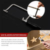 A professional jewelry saw kit showing a sliding saw blade supported by an adjustable frame and vise mechanism.