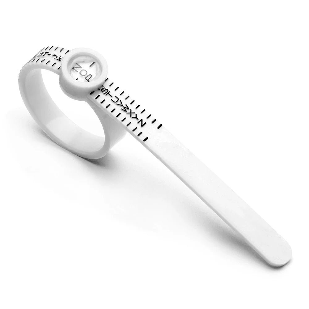 A white precision ring sizer with a magnifying tool and markings is shown on a white background.