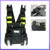 Black adjustable reflective chest harness designed for securing walkie-talkies.