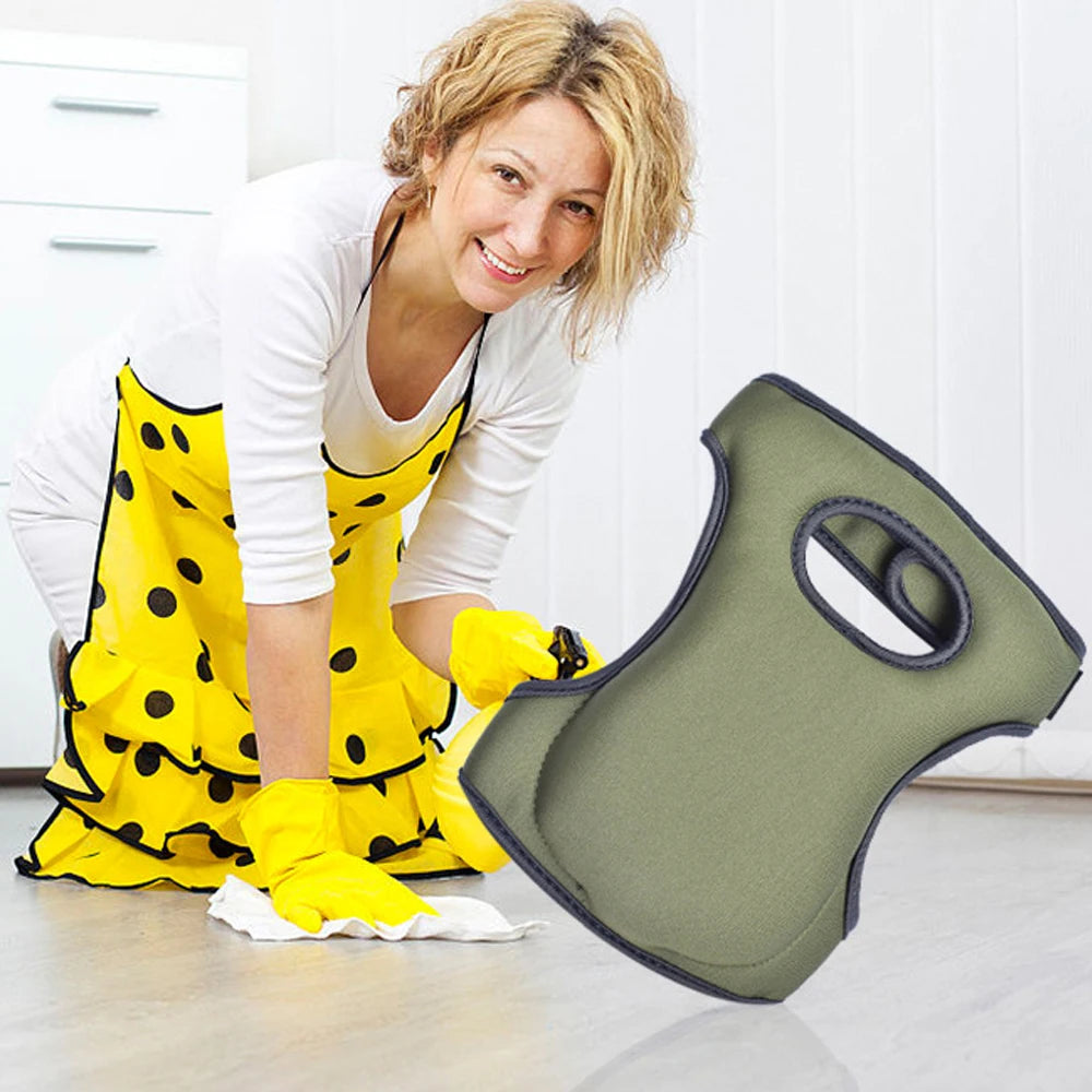 A woman wearing yellow rubber gloves is holding a green knee pad product.