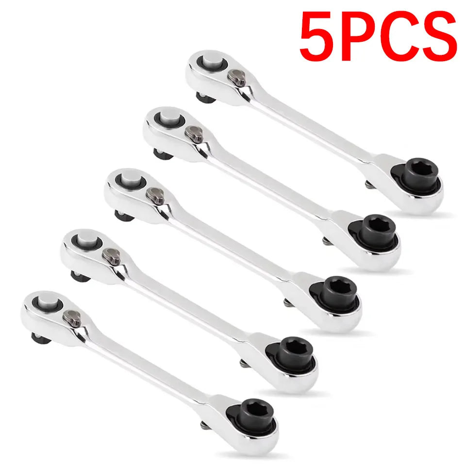 Ensemble de cinq clés à bride portables doubles embouts en argent, présentées sur fond blanc.