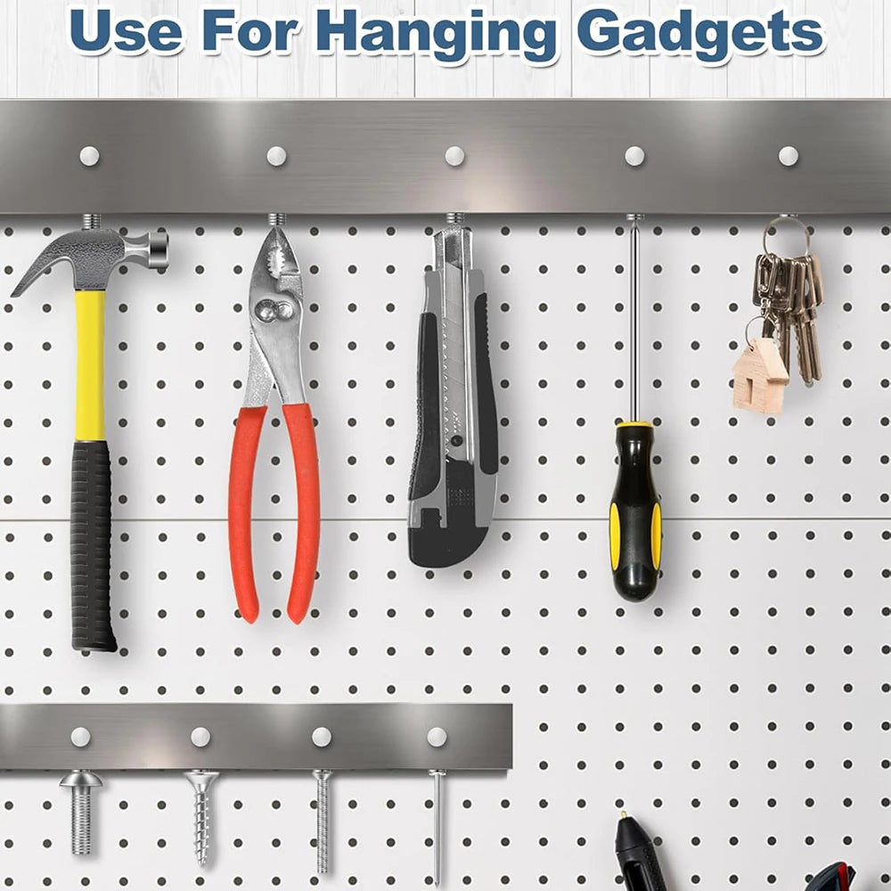 A collection of various tools and gadgets are displayed hanging on metal magnetic strips.