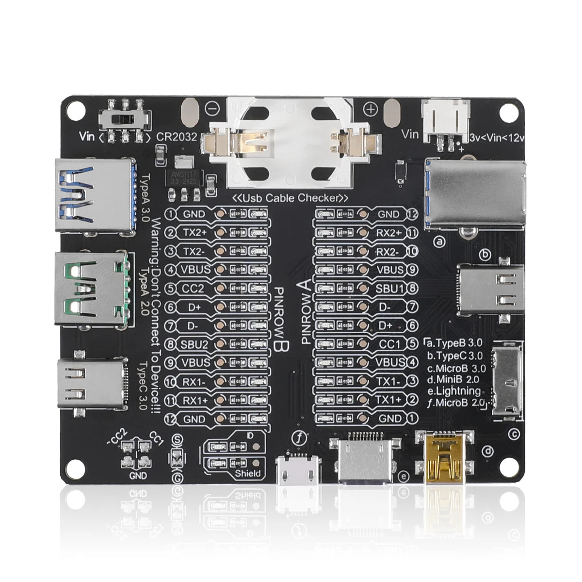 A black printed circuit board with various connectors and components for a USB cable tester and diagnostic tool