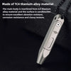 A close-up view of a silver titanium alloy screwdriver with a textured grip.