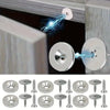 Close-up of an invisible magnetic door latch mechanism being installed on a wooden cabinet frame.