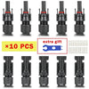 A set of ten black solar PV panel connectors for electrical connections.