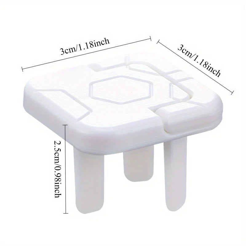 White outlet covers for baby proofing with hexagonal design and rubber feet