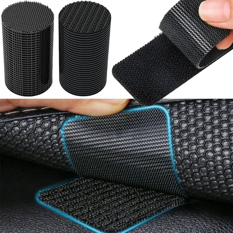 Close-up view of black heavy duty hook and loop strips being used for secure adhesion on a leather surface.