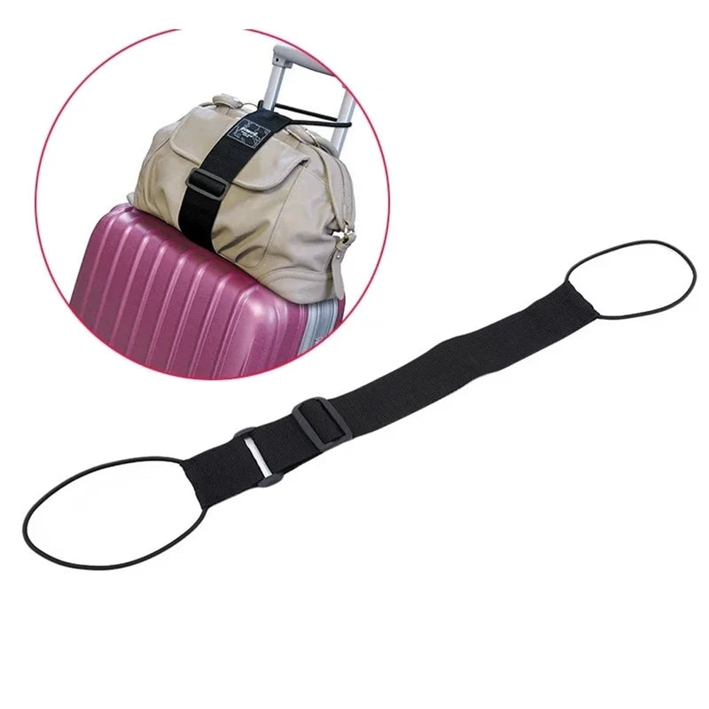 A black adjustable strap carrier belt is shown next to a pink luggage item.