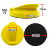 Bloc de ponçage en mousse jaune, dimensions 52mm et 18mm, à côté d'un disque de ponçage noir.