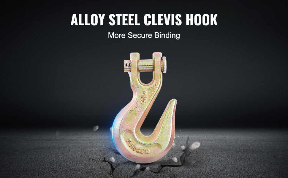 A close-up view of an alloy steel clevis hook with a forged finish resting on a cracked surface.